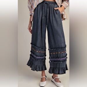 Easel Women's Black Wide-Leg Pants with Ruffle Hem